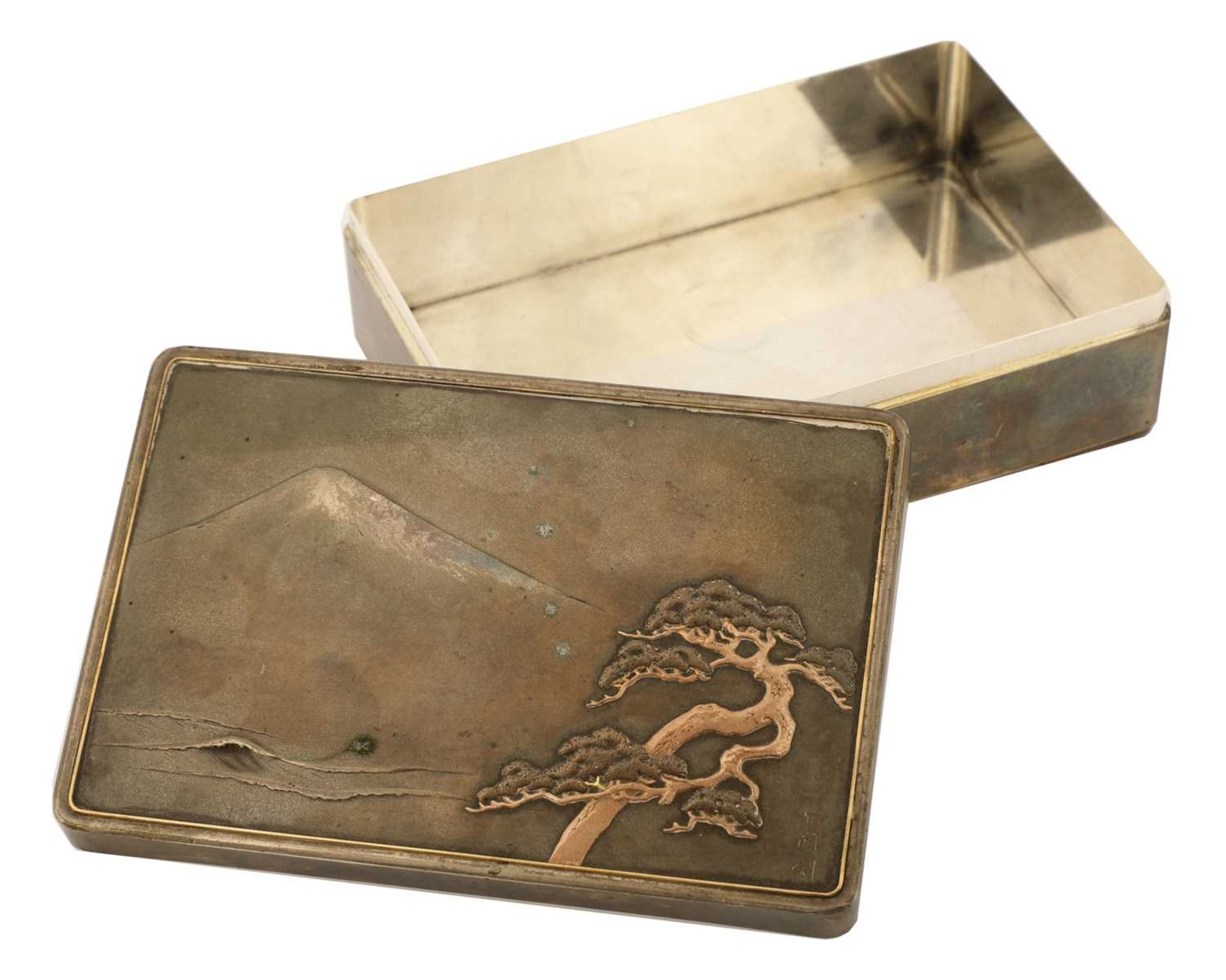 A Japanese silver box and cover,