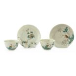 A pair of Chinese famille rose teacups,