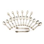 A quantity of silver teaspoons and tongs,