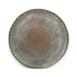 A large Persian metal tray of circular form,