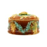 A Victorian majolica game pie dish in the manner of Wedgwood,