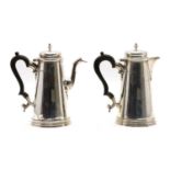 A silver coffee pot,