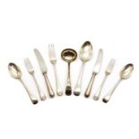 An eight place setting of Victorian Old English pattern silver flatware,