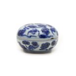 A Chinese blue and white box and a matching cover,