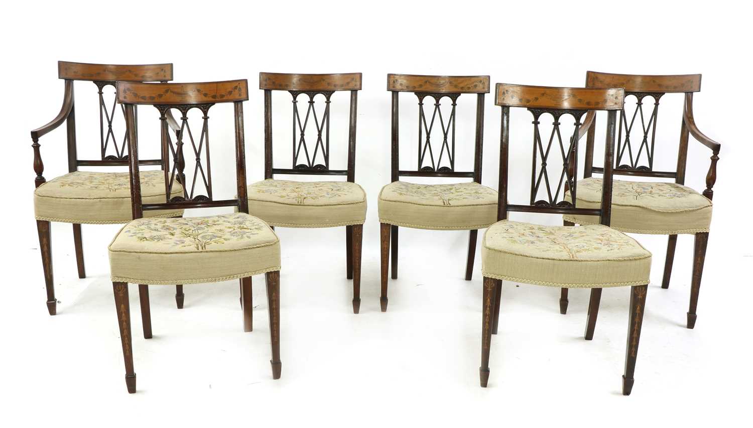 A set of six Edwardian mahogany and inlaid satin wood bar back dining chairs