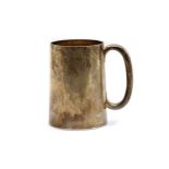 A Victorian glass bottomed silver mug,