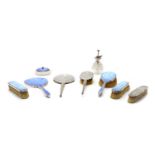 A silver and enamel dressing set