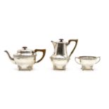 A three piece silver tea service