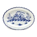 An early 19th century blue and white oval pearl ware plate,