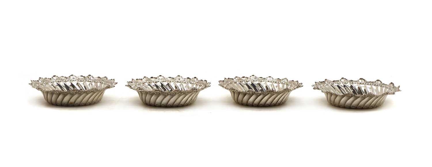 A set of four Victorian silver bonbon dishes,