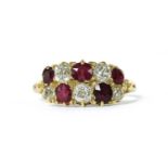 A gold ruby and diamond ring,