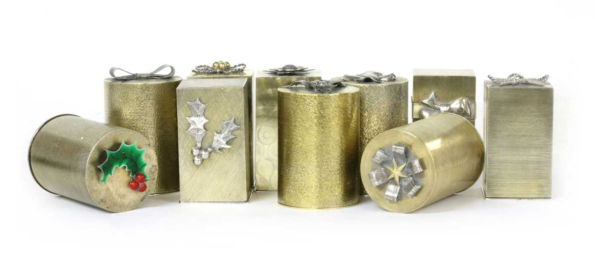 A set of ten silver and silver gilt Christmas Carol boxes, by Stuart Devlin, London 1971-1980