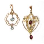 Two Edwardian gold pendants,