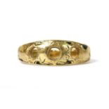 A gold three stone vacant ring mount,