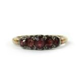 A gold and silver garnet ring,