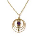 An Edwardian gold amethyst and seed pearl pendant,