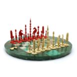 A stained bone chess set,