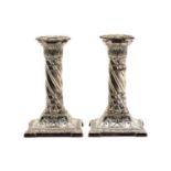 A pair of Victorian silver dwarf candlesticks,