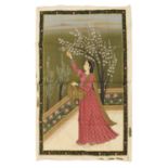An Indian painting on silk depicting a woman in flowering mauve gown,