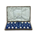 A set of twelve silver apostle spoons and sugar tong set,
