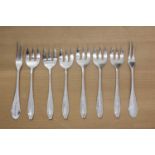 A set of six silver seafood/salad forks,
