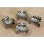 A set of four Victorian silver salt cellars,