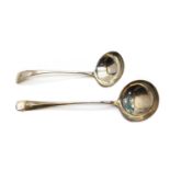 A silver soup ladle,