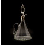 A silver mounted cut glass claret jug,