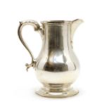 A silver baluster form water jug,