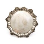 A silver salver of circular form by Alexander Clark & Co,