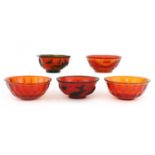 A collection of three Chinese overlay Peking glass bowls,