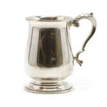 A Georgian style silver mug,