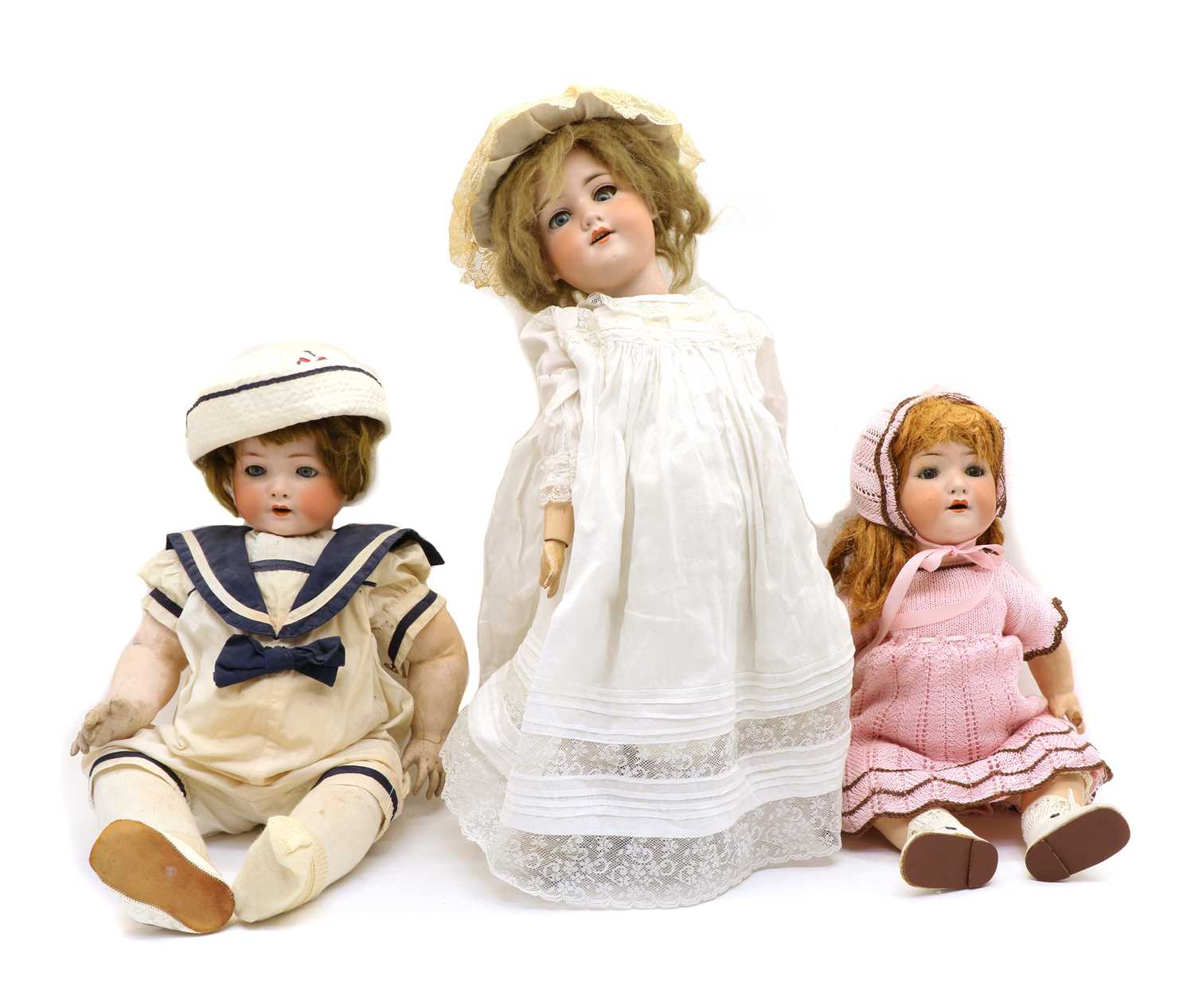 Three Bisque headed dolls,