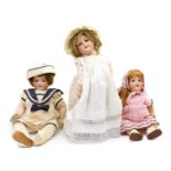 Three Bisque headed dolls,