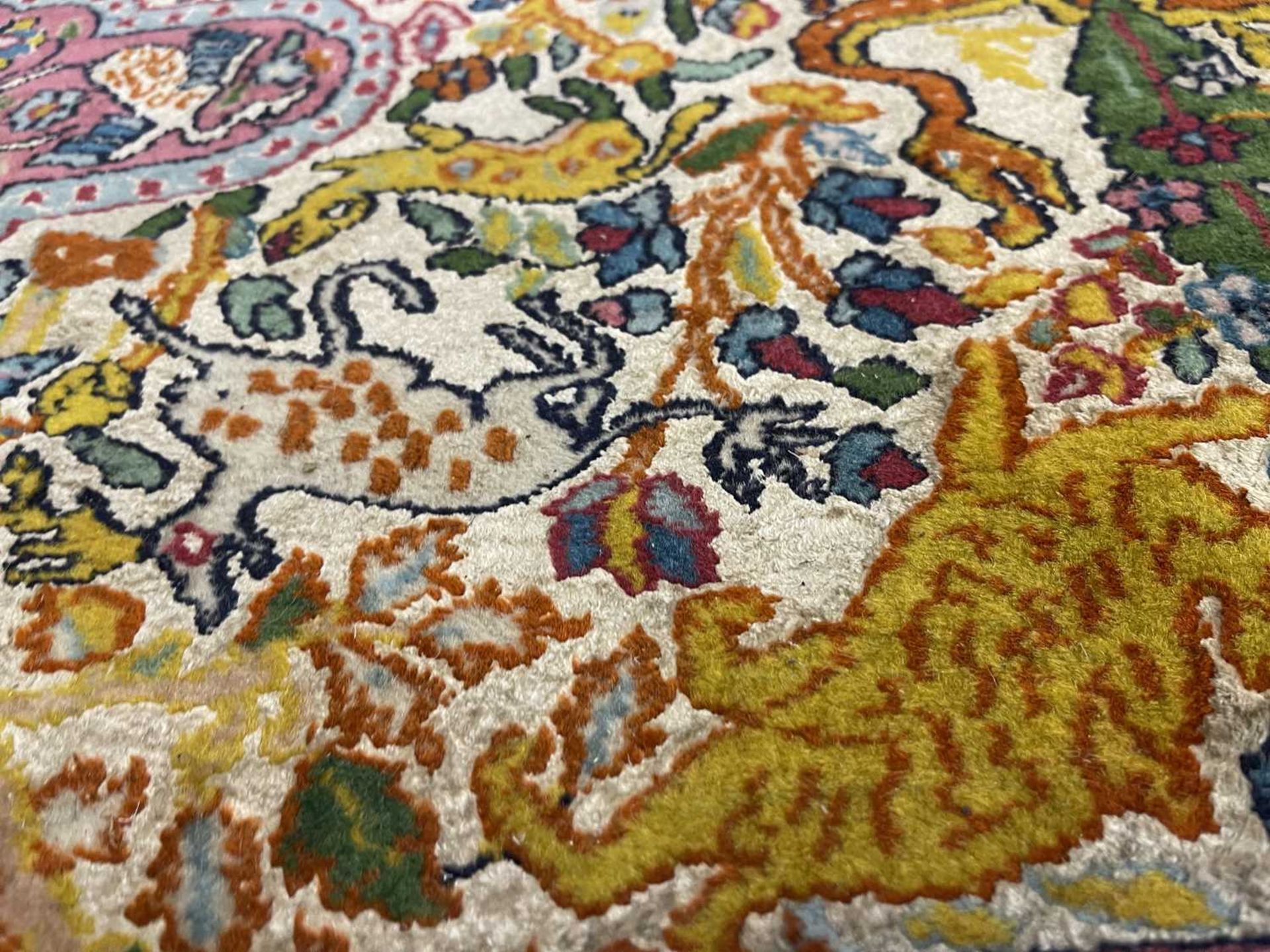 A Persian wool rug with silk highlights, - Bild 15 aus 22