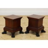 A pair of mahogany stands,