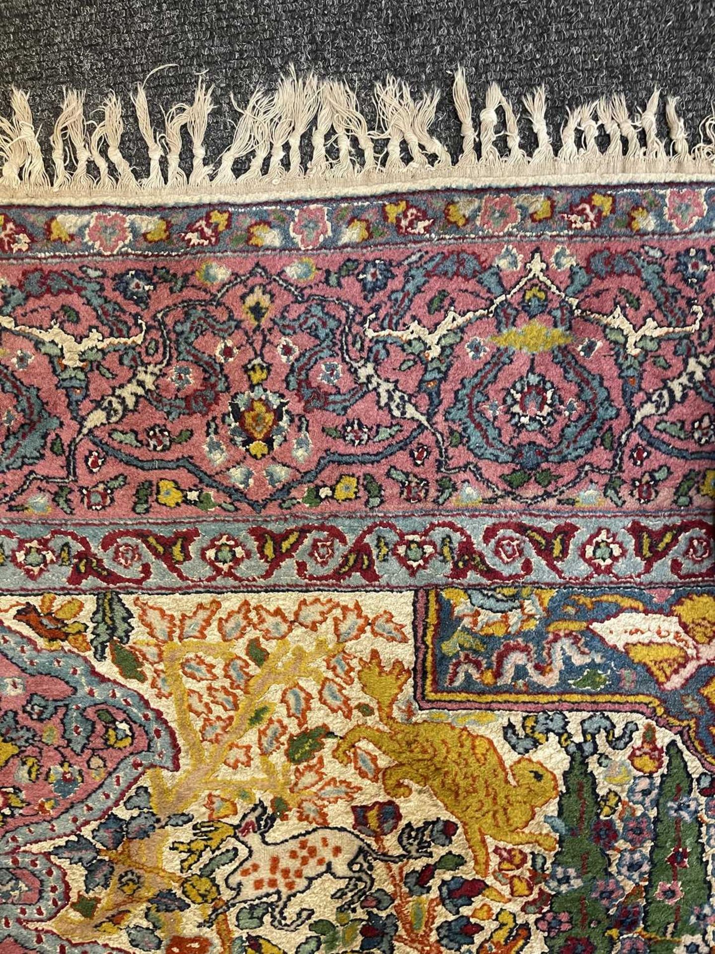 A Persian wool rug with silk highlights, - Bild 21 aus 22