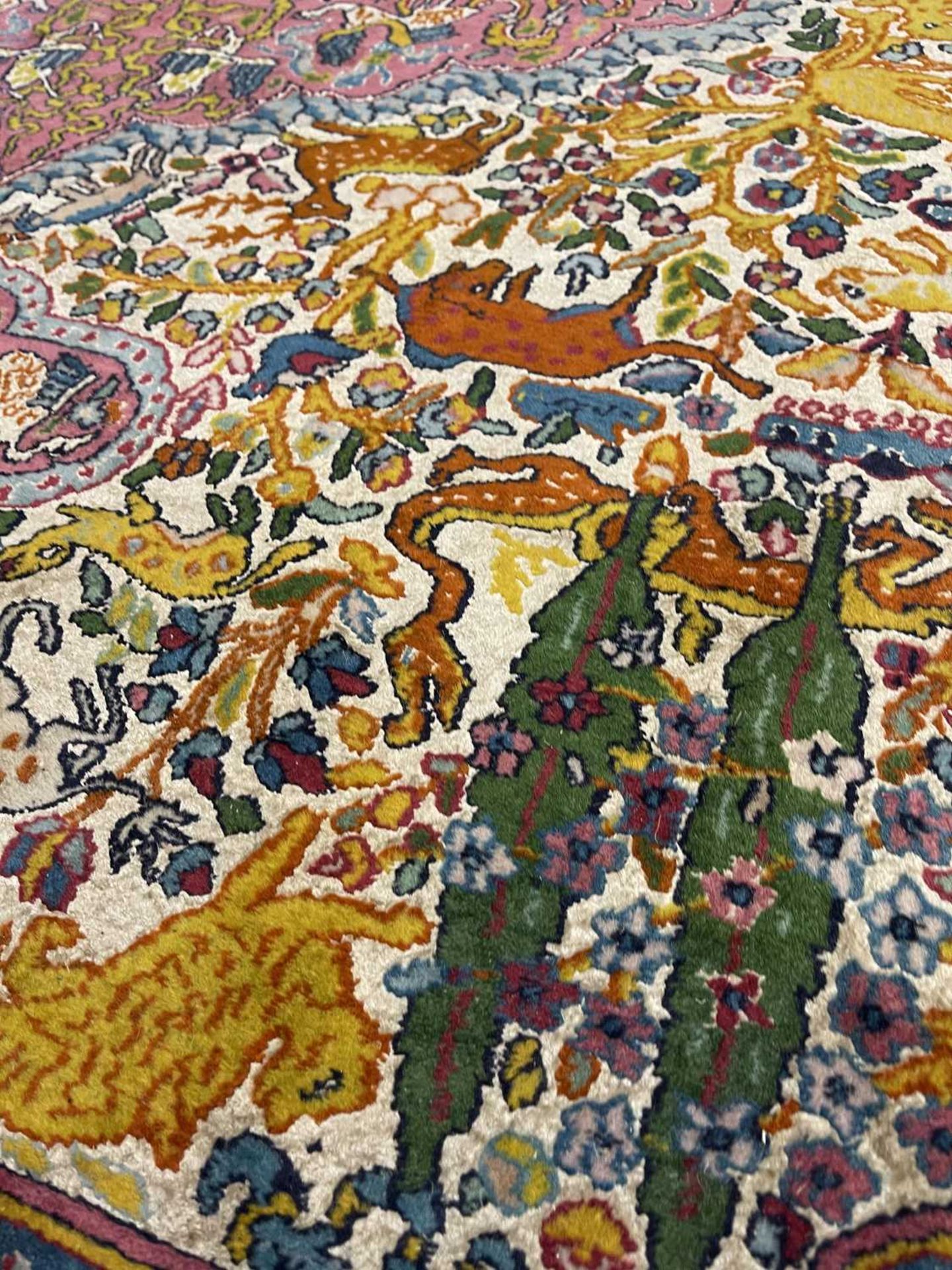 A Persian wool rug with silk highlights, - Bild 17 aus 22