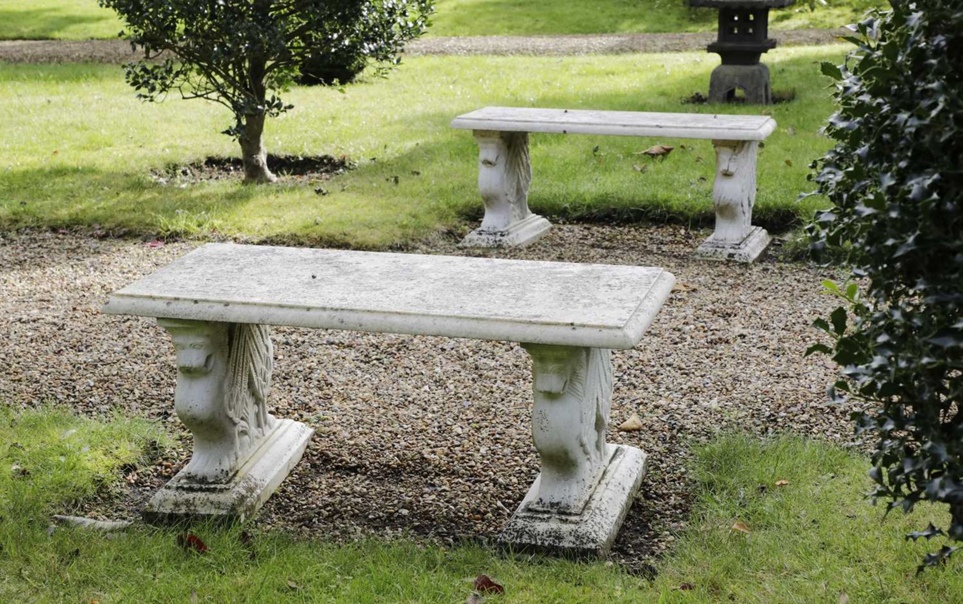 A pair of marble garden seats,