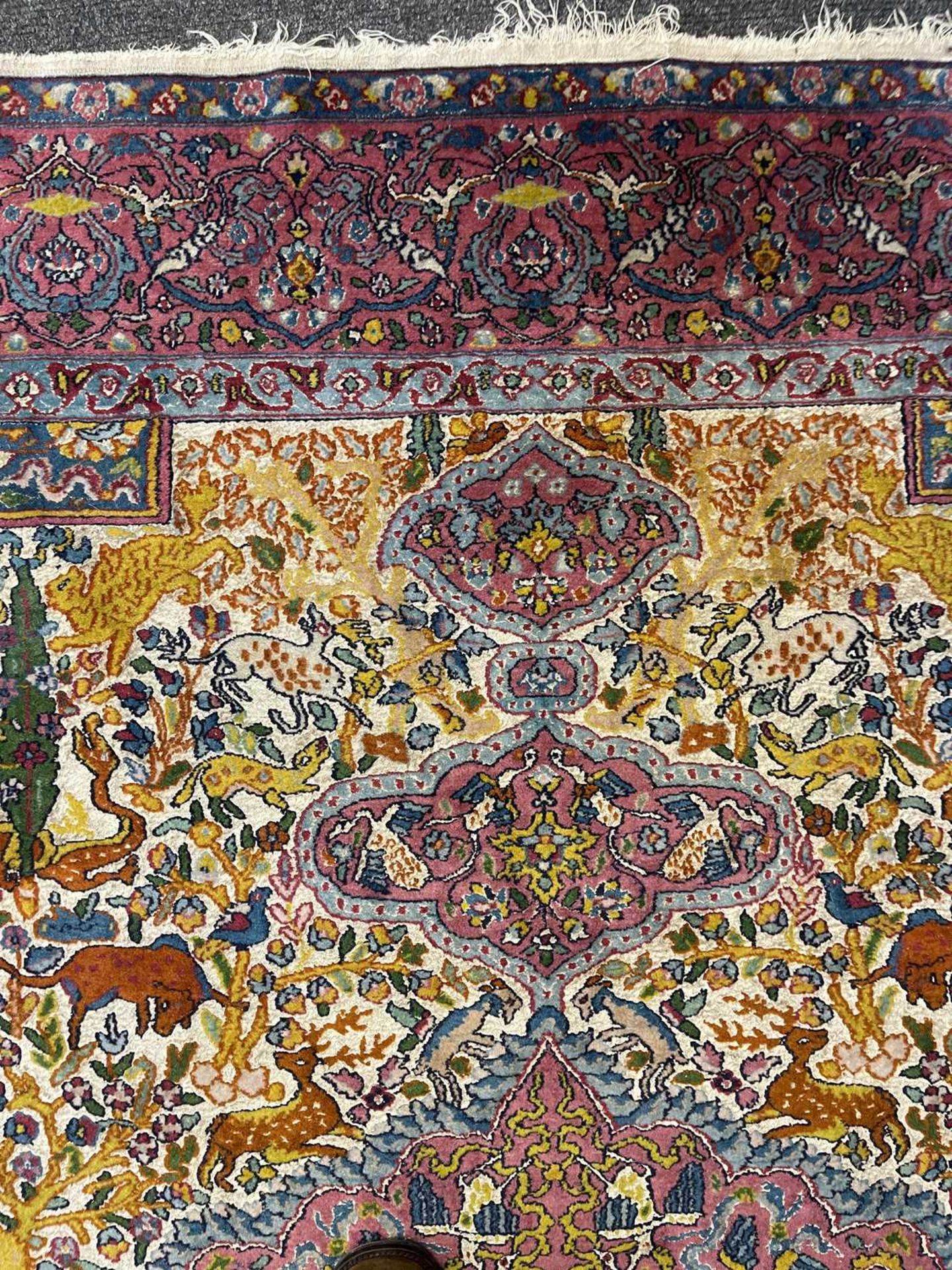 A Persian wool rug with silk highlights, - Bild 13 aus 22