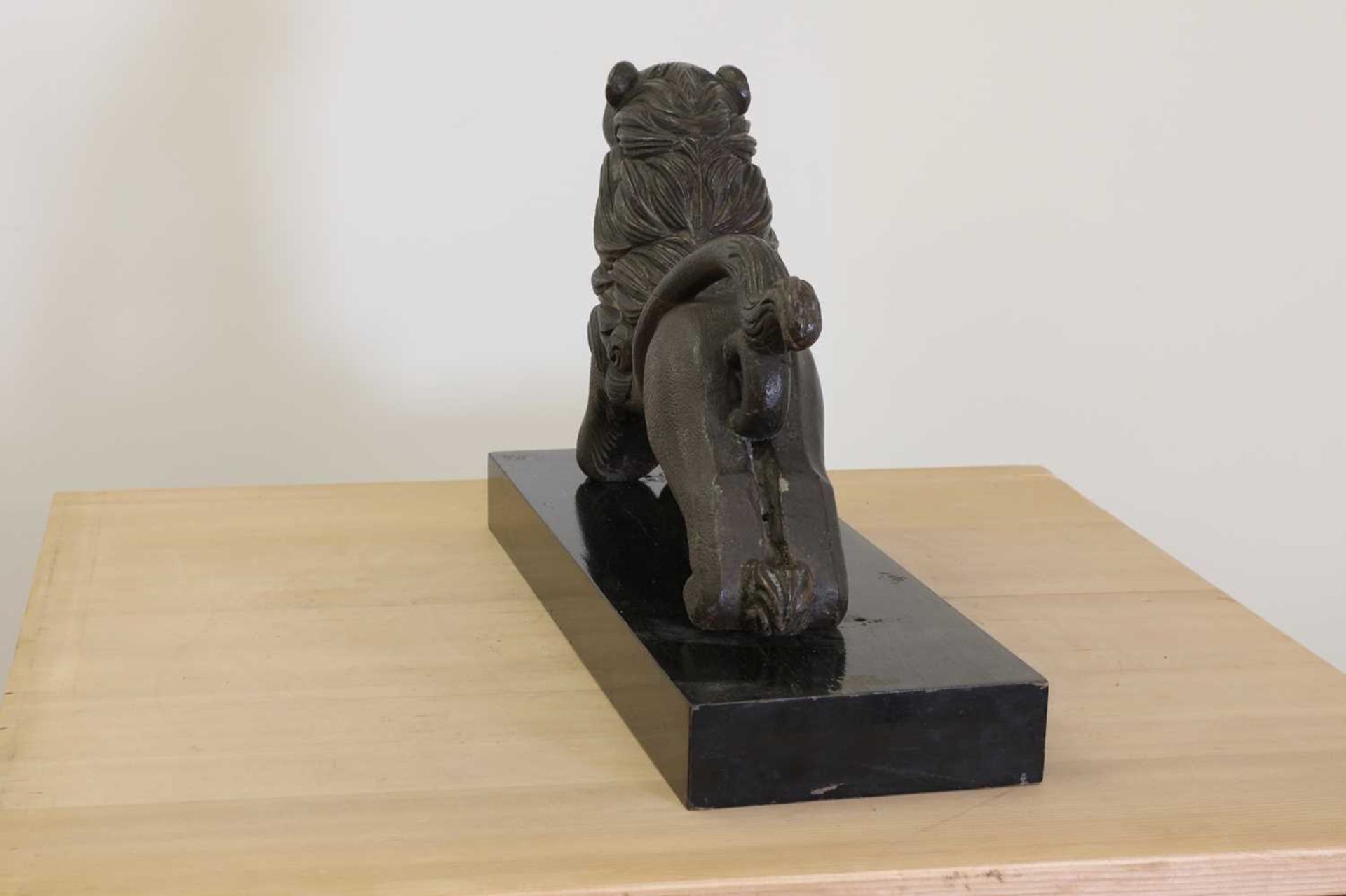 A carved wooden figure of a lion passant, - Image 4 of 4