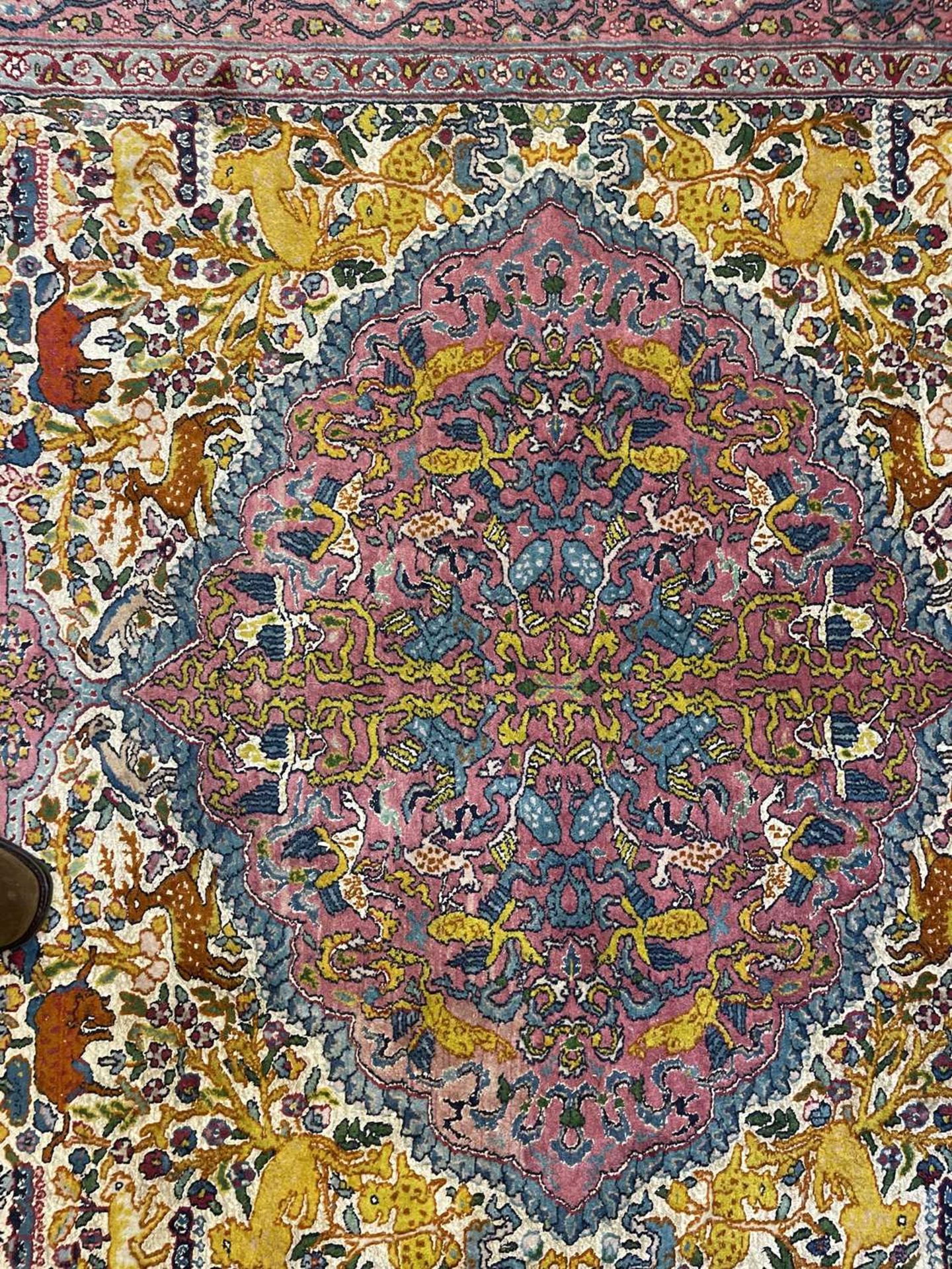 A Persian wool rug with silk highlights, - Bild 9 aus 22