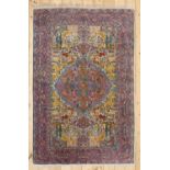 A Persian wool rug with silk highlights,