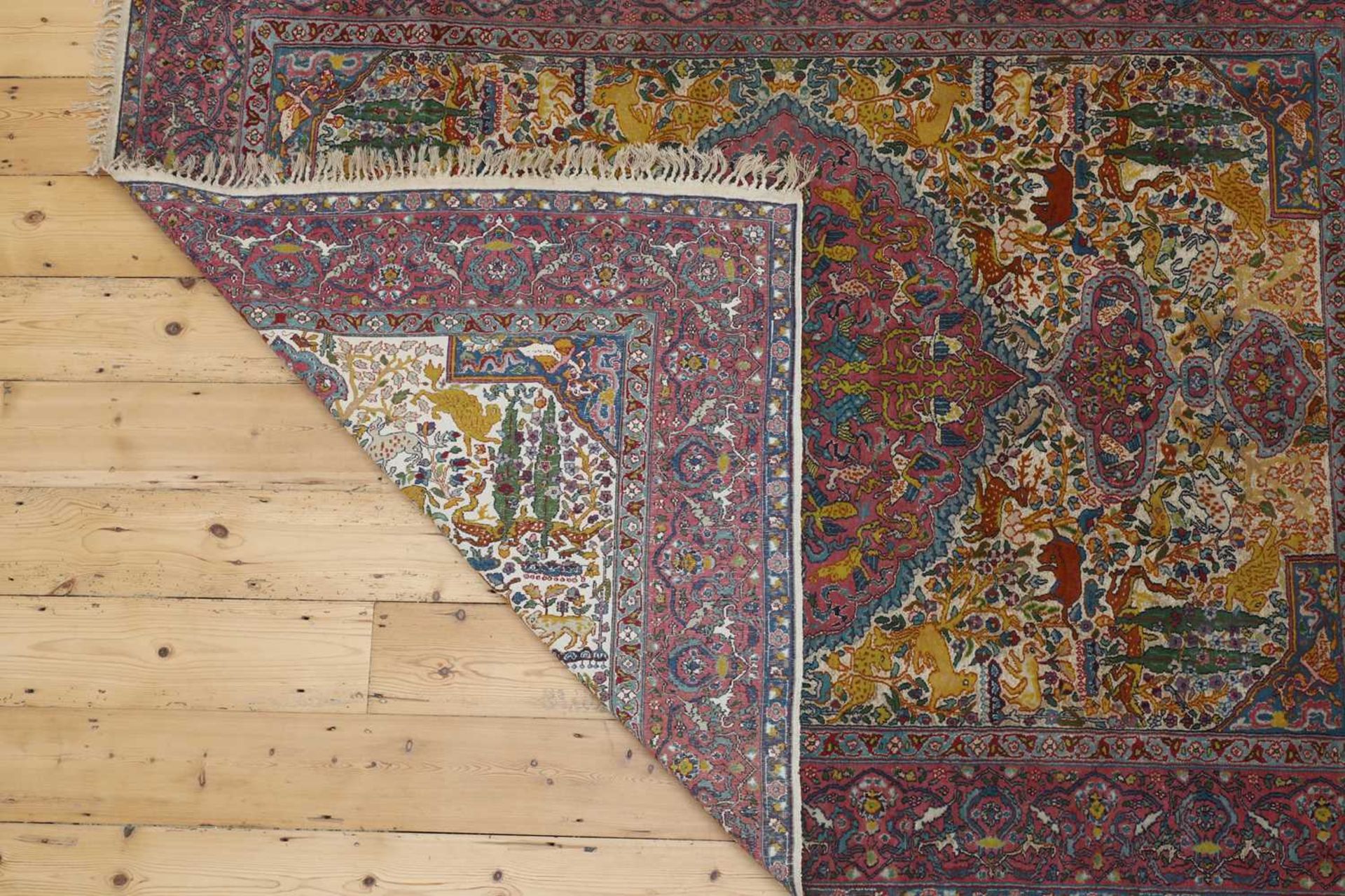 A Persian wool rug with silk highlights, - Bild 6 aus 22