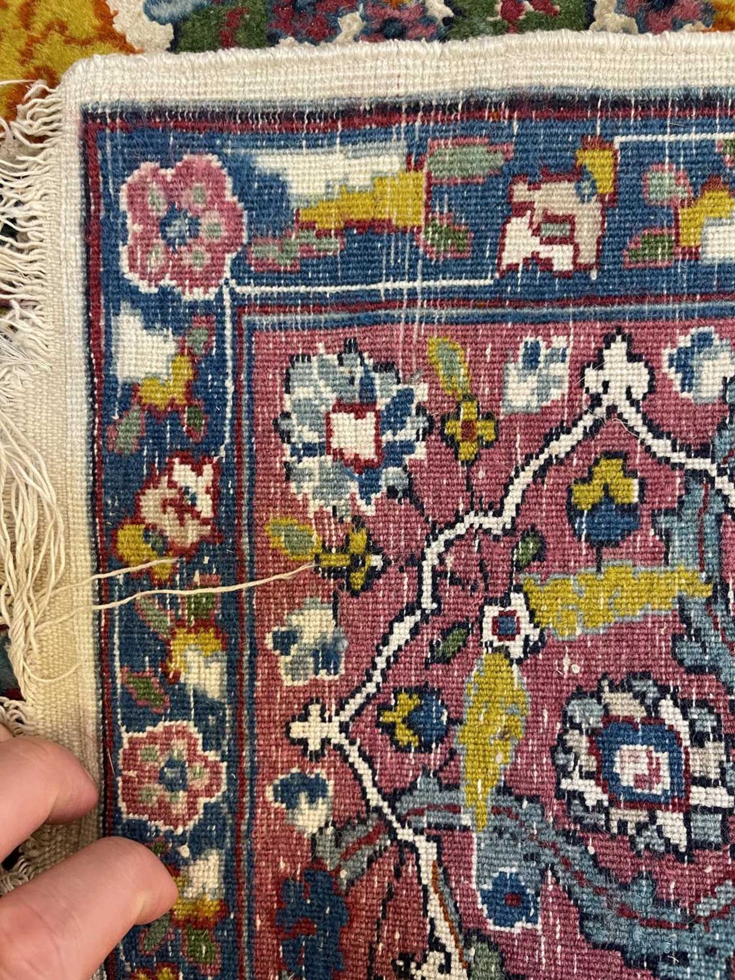 A Persian wool rug with silk highlights, - Bild 18 aus 22
