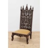 A colonial rosewood high-backed chair,