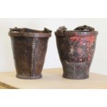 A near pair of leather fire buckets,