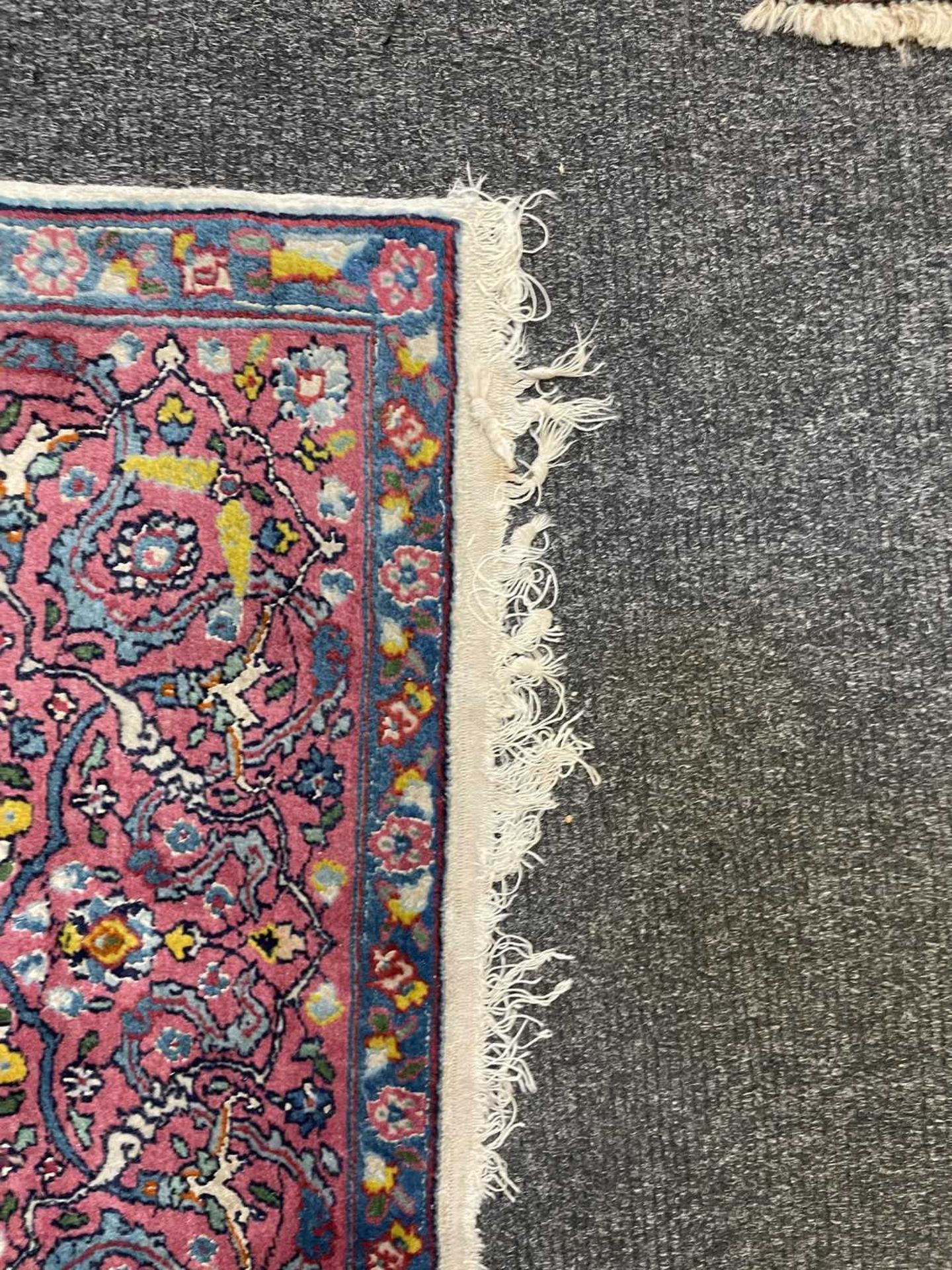 A Persian wool rug with silk highlights, - Bild 10 aus 22
