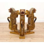 A carved wooden, papier mâché and painted occasional table,