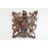 A large carved and polychrome painted Royal Coat of Arms of the United Kingdom,